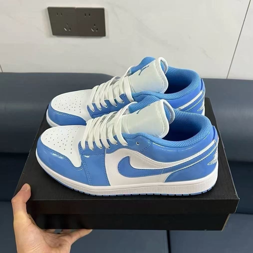 Chunyuan AJ1 Meituan negro, blanco y amarillo campus de moda baja pareja de hombres y mujeres zapatos de skate casuales