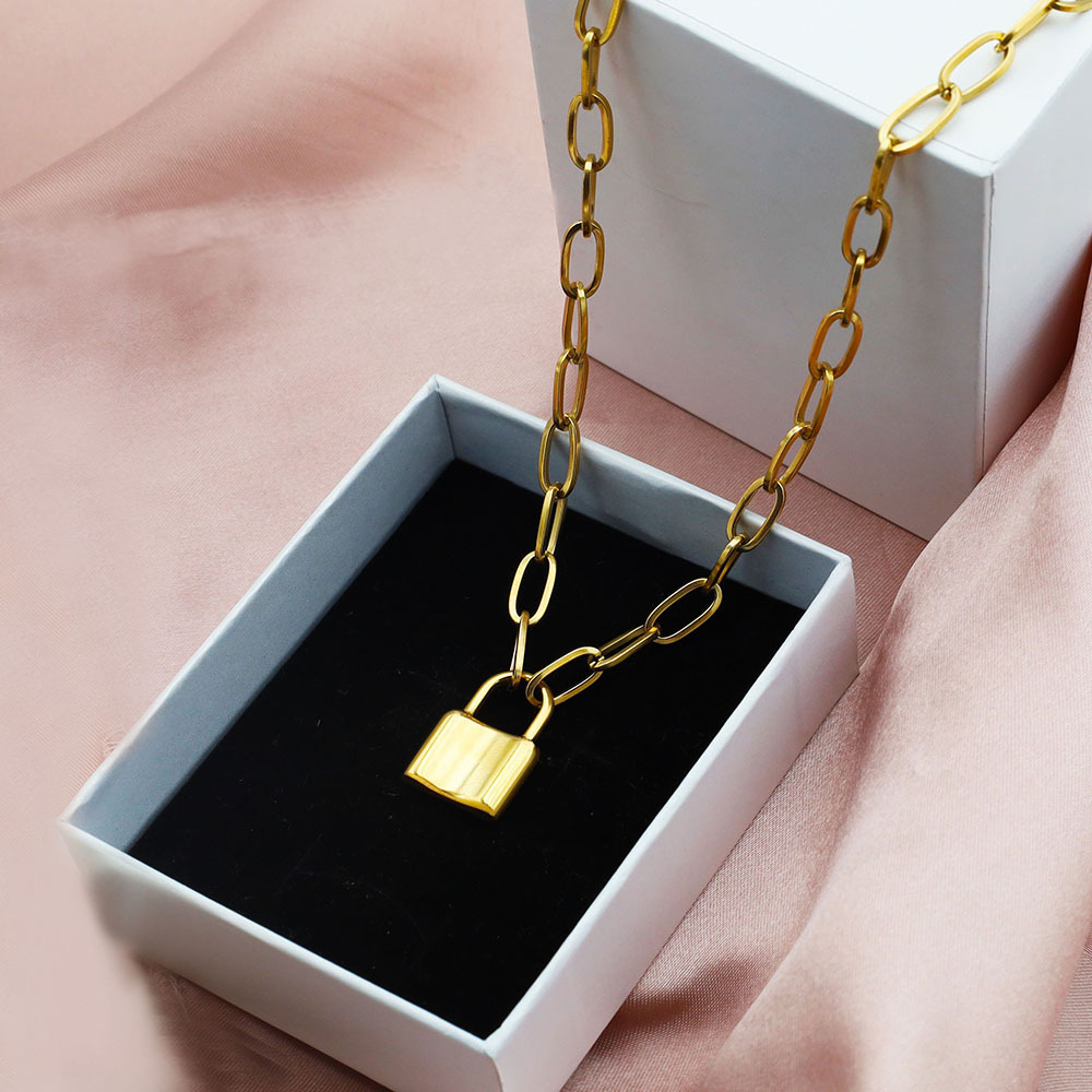 Transfronterizo europeo y americano Venta caliente vintage titanio acero cerradura colgante collar femenino punk estilo temperamento grueso cadena joyería 18K oro