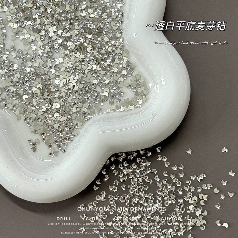 Nuevo taladro de malta de manicuras taladro de fondo plano taladro de manicuras pequeño taladro de trigo transparente K9 decoración de uñas de diamante al por mayor