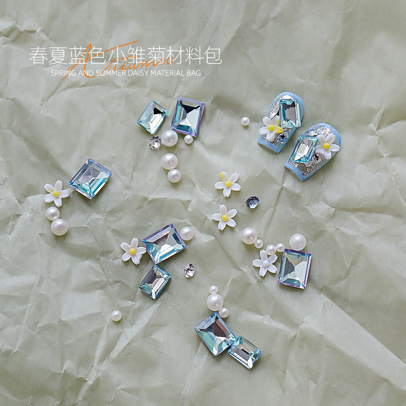 Manicura nueva primavera y verano hierba verde diamante verde margarita pequeña pila diamante perla verde puntiagudo diamante perla combinación de material de perla al por mayor