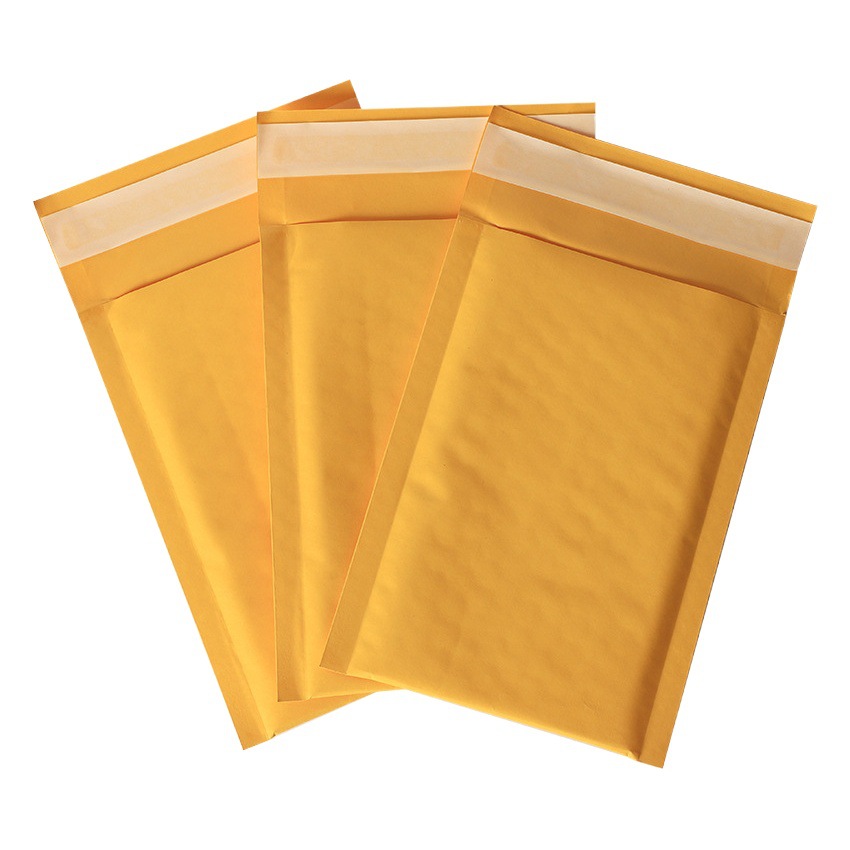 Bolso de sobre de burbuja de papel Kraft amarillo grueso bolso de espuma impermeable bolso de embalaje rápido bolso expreso bolso de burbuja al por mayor