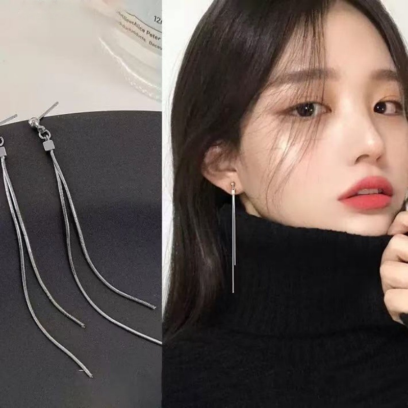 Aretes largos de bordas femeninas famosas líneas frías de aretes de agujas de plata de alta calidad 2025 nuevos aretes de moda