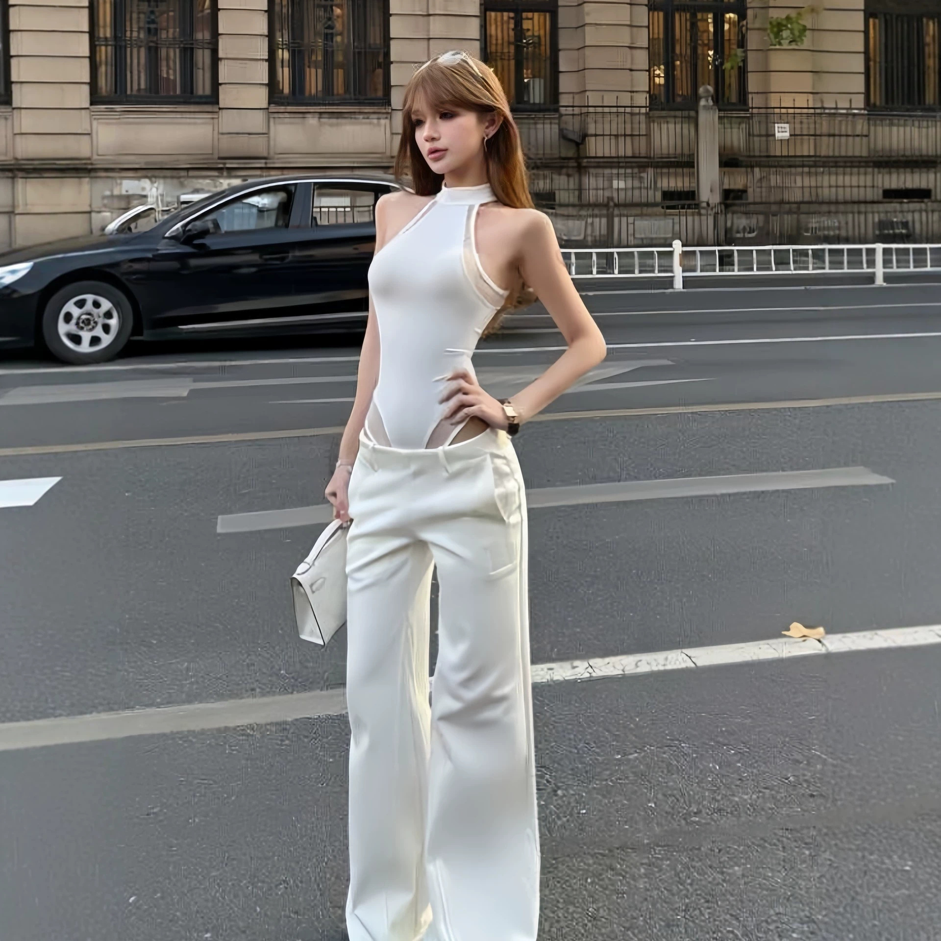 Sexy and fashionable vest-style bodysuit with mesh patchwork design, new summer 2026 style, stand-up collar, fitted top.