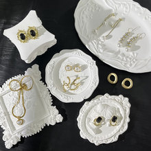 ���չʾ�ܰ�ɫʯ�����������Ʒ�ռ{�бP���h�錚����Ĕz����