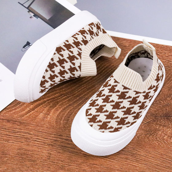 2022 autumn and winter New versatile children's sports shoes for men and women children flying woven shoes thickened soft sole pedal wholesale