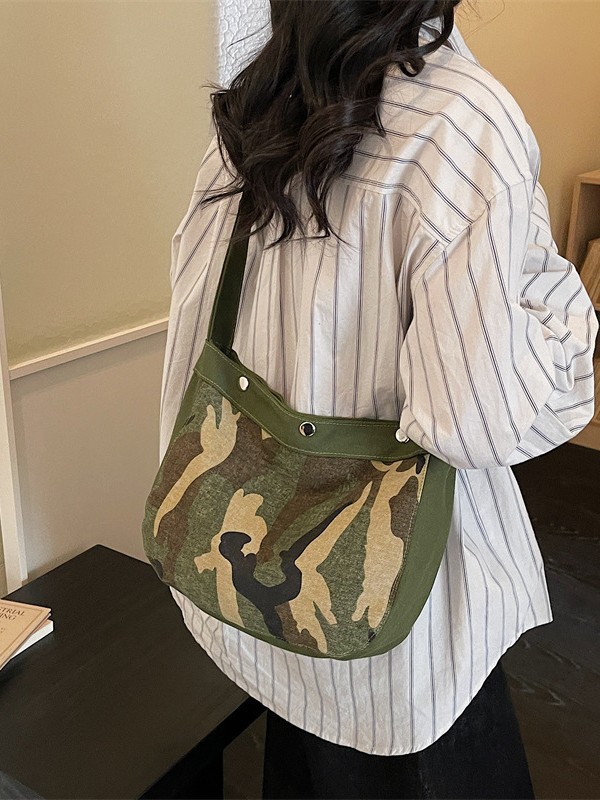 Casual bolso de camuflaje de gran capacidad para mujeres 2026 nuevo lienzo retrógrado simple mochila de hombro para viajar bolsa