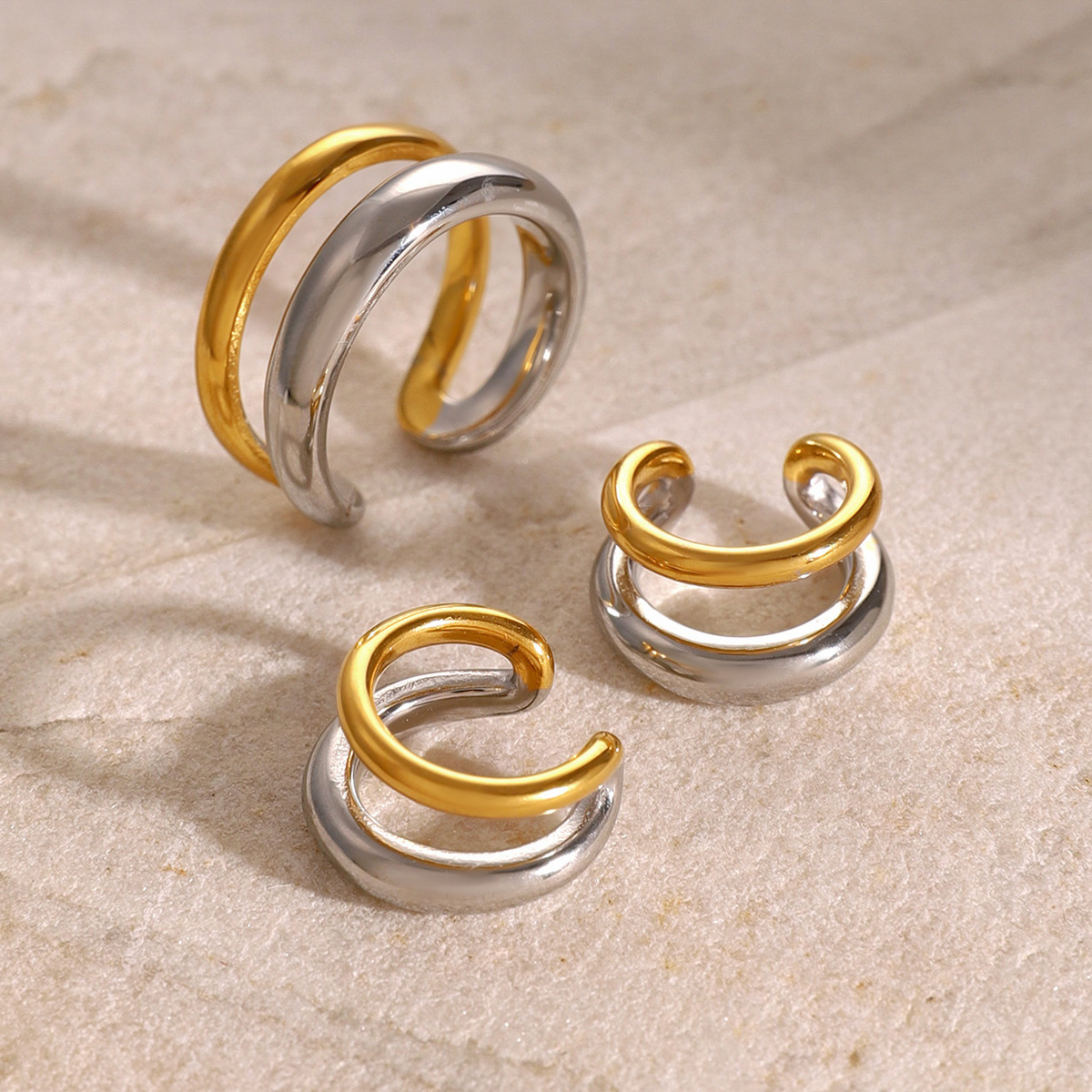 Ins aire frío 18k oro acero inoxidable color de doble anillo abierto europeo y americano oro y plata minimalistas de acero titanio de dos colores clips de orejas