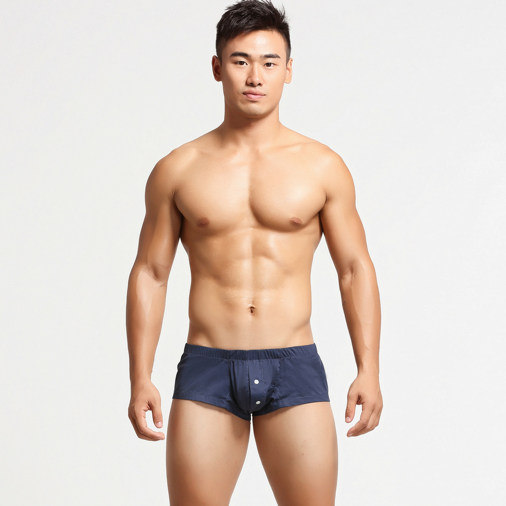 Venta al por mayor SEOBEAN Xiben hombres ropa interior de cintura baja pantalones moda boxeadores botón letras transpirable sueltos