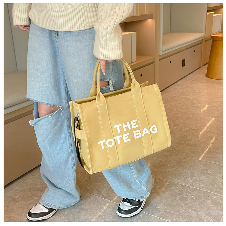 Bolso de lona Hebei Baiou para mujer, de color sólido con estampado de letras, bolso bandolera de un solo hombro con estampado de letras.