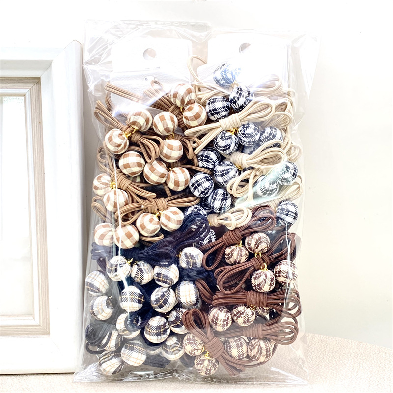 20 estilo coreano de dibujos animados lindo té de leche Tarjeta de color Banda de pelo banda de goma de color de primavera tienda física supermercado 2 yuanes tienda al por mayor