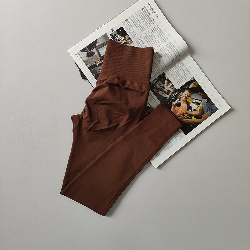 Pantalones de gimnasio sin costura europeos y estadounidenses, cintura alta, abdomen, caderas, pantalones de melocotón para correr, yoga, leggings apretadas