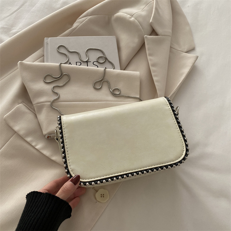 Este año, bolsos de diseño de moda para mujeres 2024, bolsos pequeños de nicho de cadena de moda, bolsos de hombro inclinados.