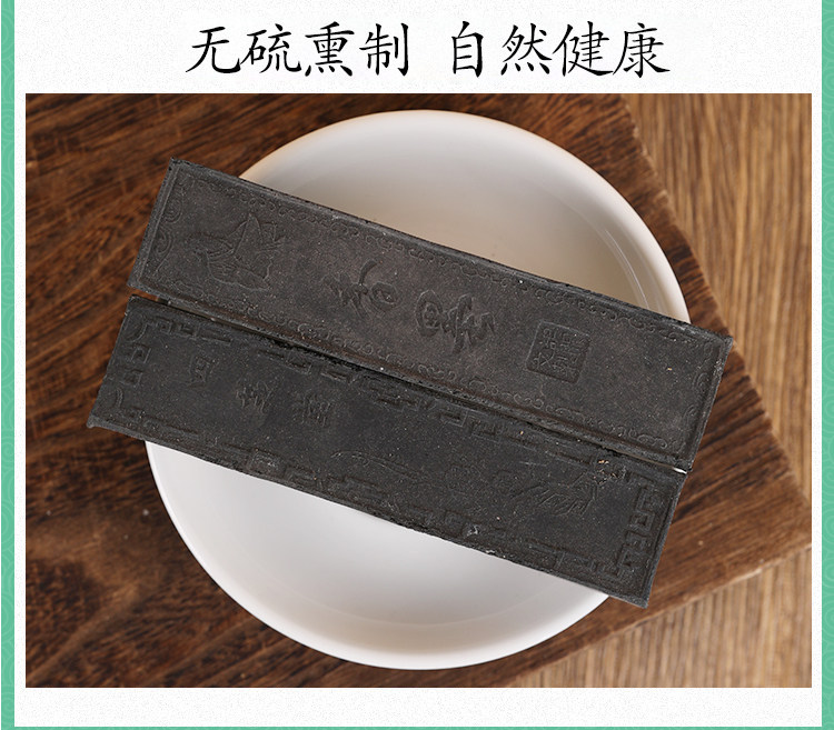Jing Xiang Mo Traditional Ink Stick 500g Aged Jing Mo Herbal Craft Piece in use