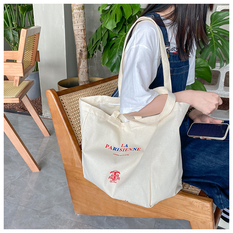 A large-capacity, sturdy Japanese-style canvas bag for women, a new 2022 simple bento handbag for girls to go to work undefined