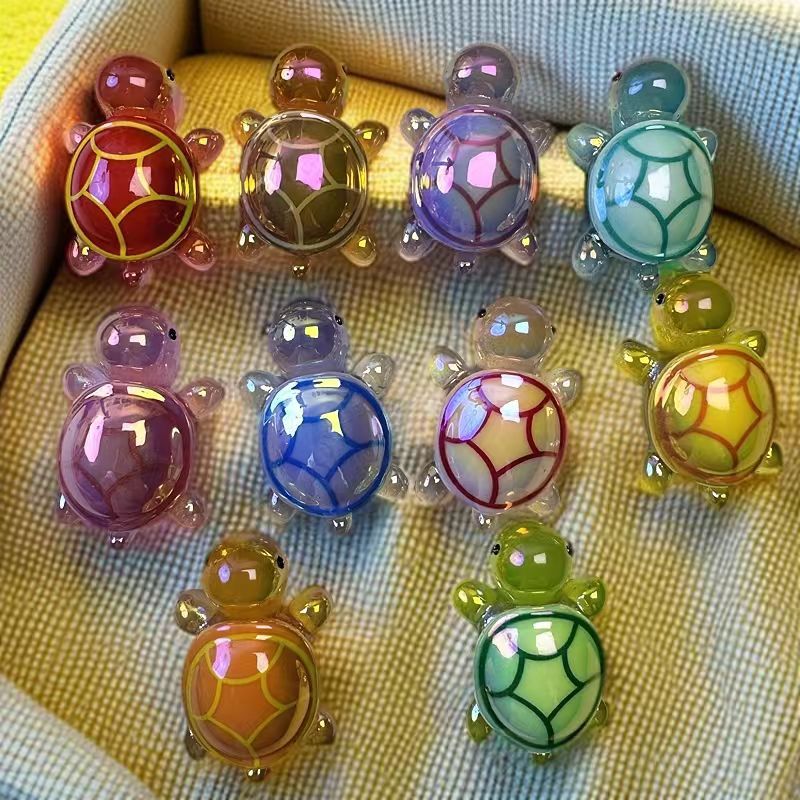 Galvanoplastia de color luminoso tortuga celebridad de la red tortuga bolsa ciega resina accesorios de dibujos animados resina bricolaje decoración de coche péndulo X20