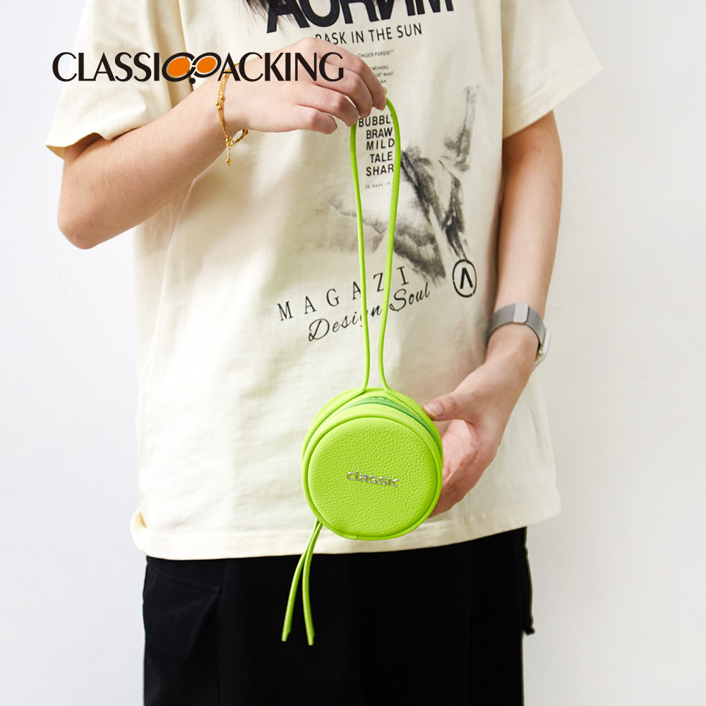 Monedero al por mayor de fábrica Material de PU verde lindo Tendencia Bolsa de almacenamiento de lápiz labial de todo fósforo Bolsa para auriculares Logotipo impreso