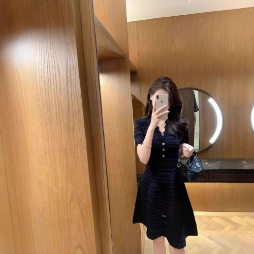 Elegant Sheath Hollowed-Out Ice Silk Dress for 2025 Summer: Wavy V-Neck, Slimming, and Body-Sculpting Knitted Skirt for Women