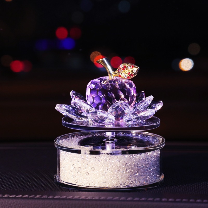 Solar-powered rotating crystal apple car-mounted lotus perfume holder ornament, elegant and feminine car interior accessory for the dashboard
