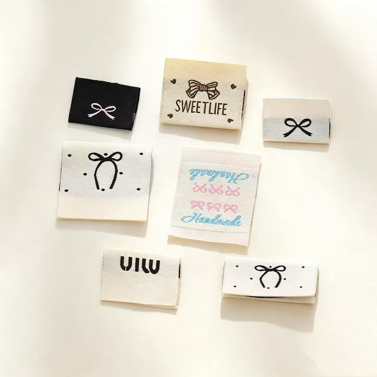 厂家批发童装辅料织唛夹标高纬密彩色蝴蝶结手工品商标厂家批发