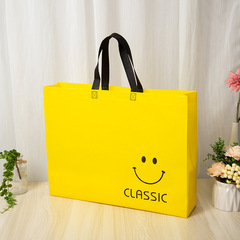 Manufacturer wholesale non-woven fabric color printed and laminated cartoon clothing handbags shipped on the same day and can be printed with LOGO