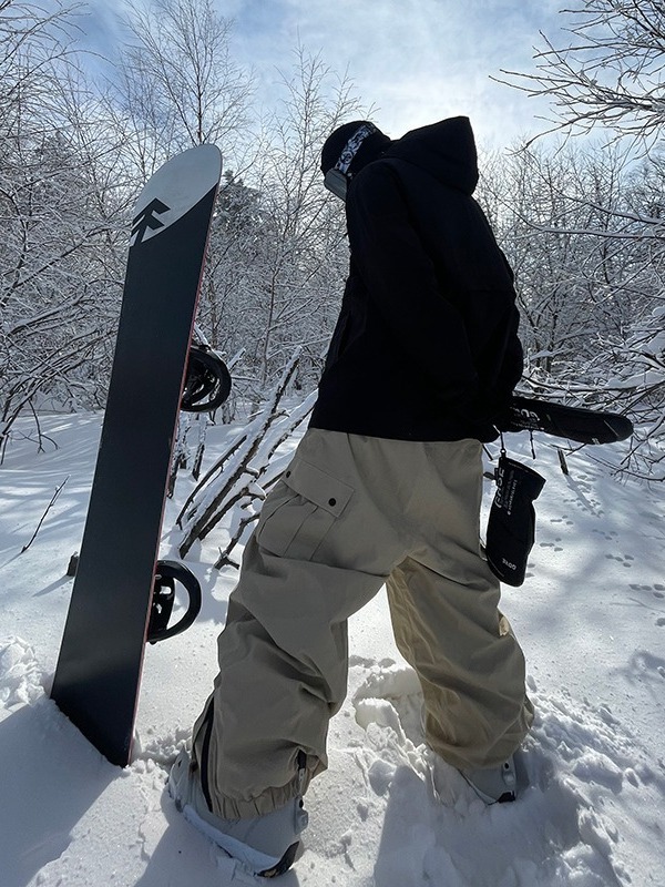 Pantalones de snowboard a prueba de viento impermeables sueltos de primavera y otoño pantalones de hombres y mujeres deportes al aire libre multi-Bolsillo casual pantalones atados al tobillo