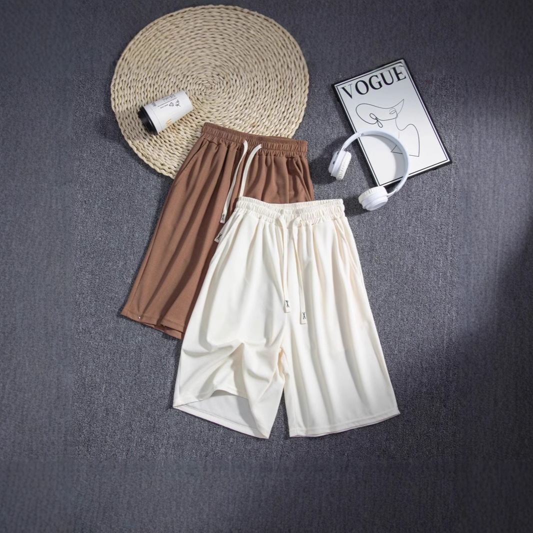 Hombre de verano casual holgado coreano waffle pantalon transpirable universal juvenil retro americano pantalones de cinco puntos