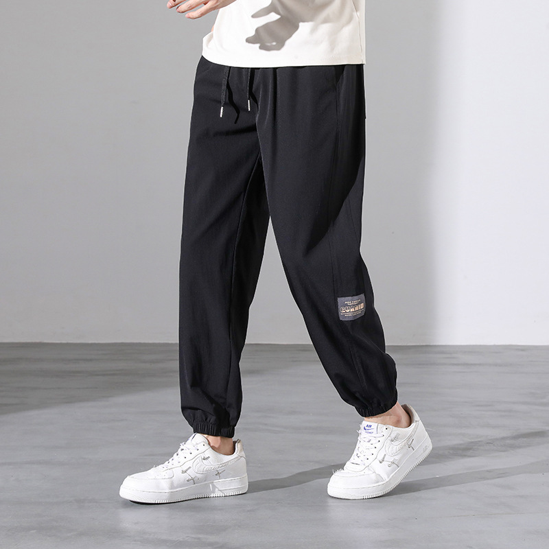 Otoño y primavera de verano de tendencia suelta pantalones casuales de pies de hielo pantalones de hombre nueve pantalones fuente de fabricación