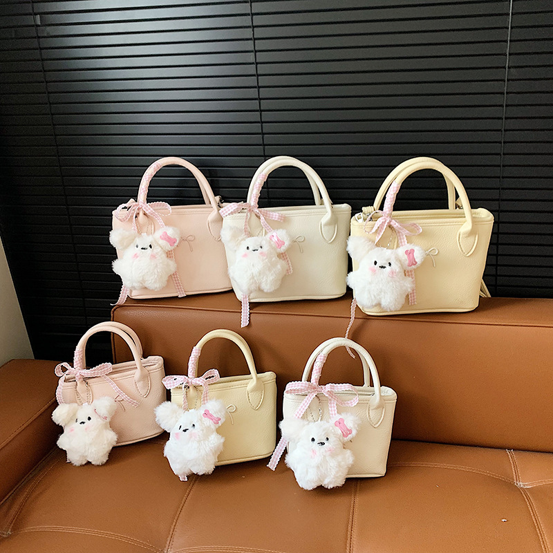 Bolsa de balde coreana para niñas estilo extranjero simple color sólido mini bebé bolsa de cesta de verduras 2026 nuevo bolso para niños