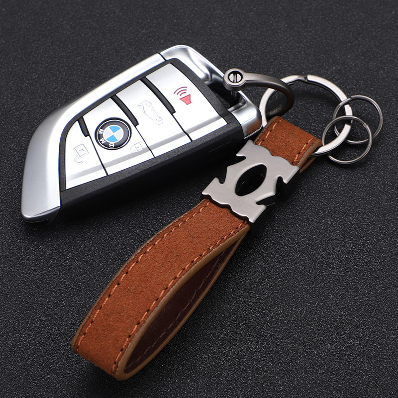 Nuevo llavero de coche de moda llavero de piel de gamula pareja de hombres y mujeres colgante creativo de personalidad de alta gama