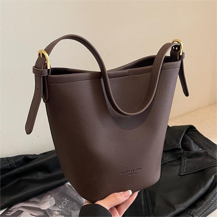 Bolso de las axilas del todo-fósforo de alta calidad para las mujeres 2024 nueva bolsa de cubo de moda casual para ir al trabajo Otoño e Invierno bolsa de hombro
