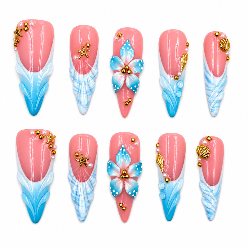 Handmade press-on nails in pink and blue with a contrasting ocean style, long pointed tips, 3D floral, shell, and starfish designs, 10-piece set, in stock for wholesale