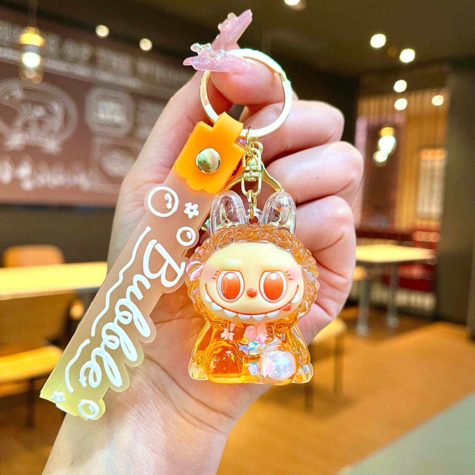 Llavero red acrílico con arena flotante