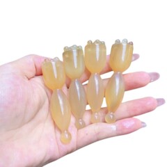 高原の羊の角の目の部の蓮の蓬は筋の棒をかき回して穴の棒をつけて目の部をマッサージして暗い目の周りの目の袋の細い紋様を改善します。