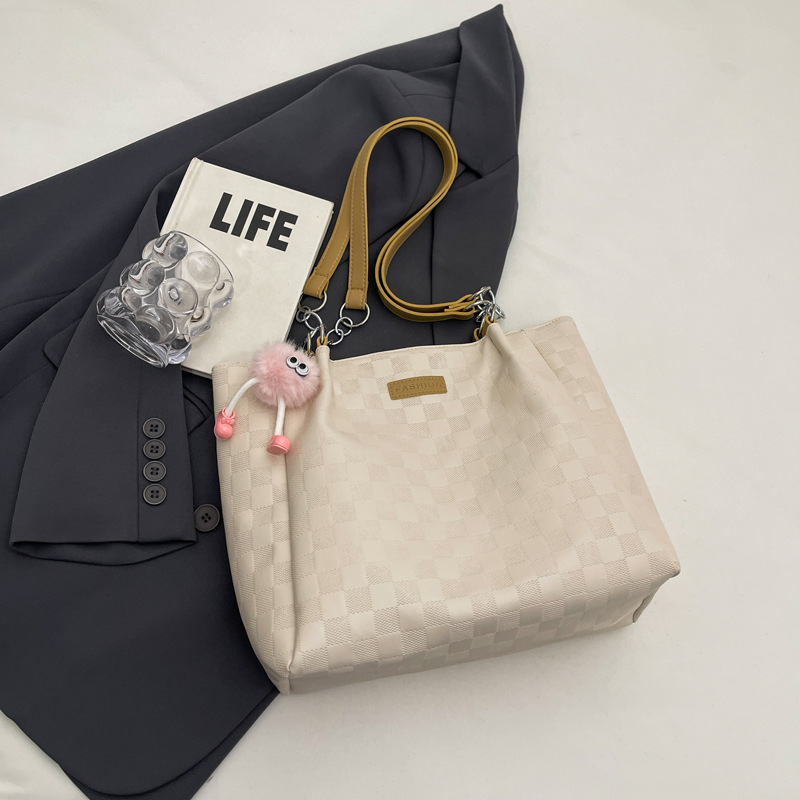 Bolsa de hombro a cuadrillas de alto nivel 2024, nueva bolsa de viaje simple de gran capacidad para estudiantes universitarios.