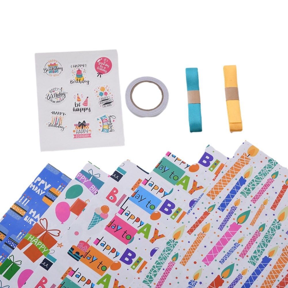 Nuevo papel recubierto creativo papel de embalaje de impresión globo de cumpleaños pastel vela papel de regalo de dibujos animados al por mayor