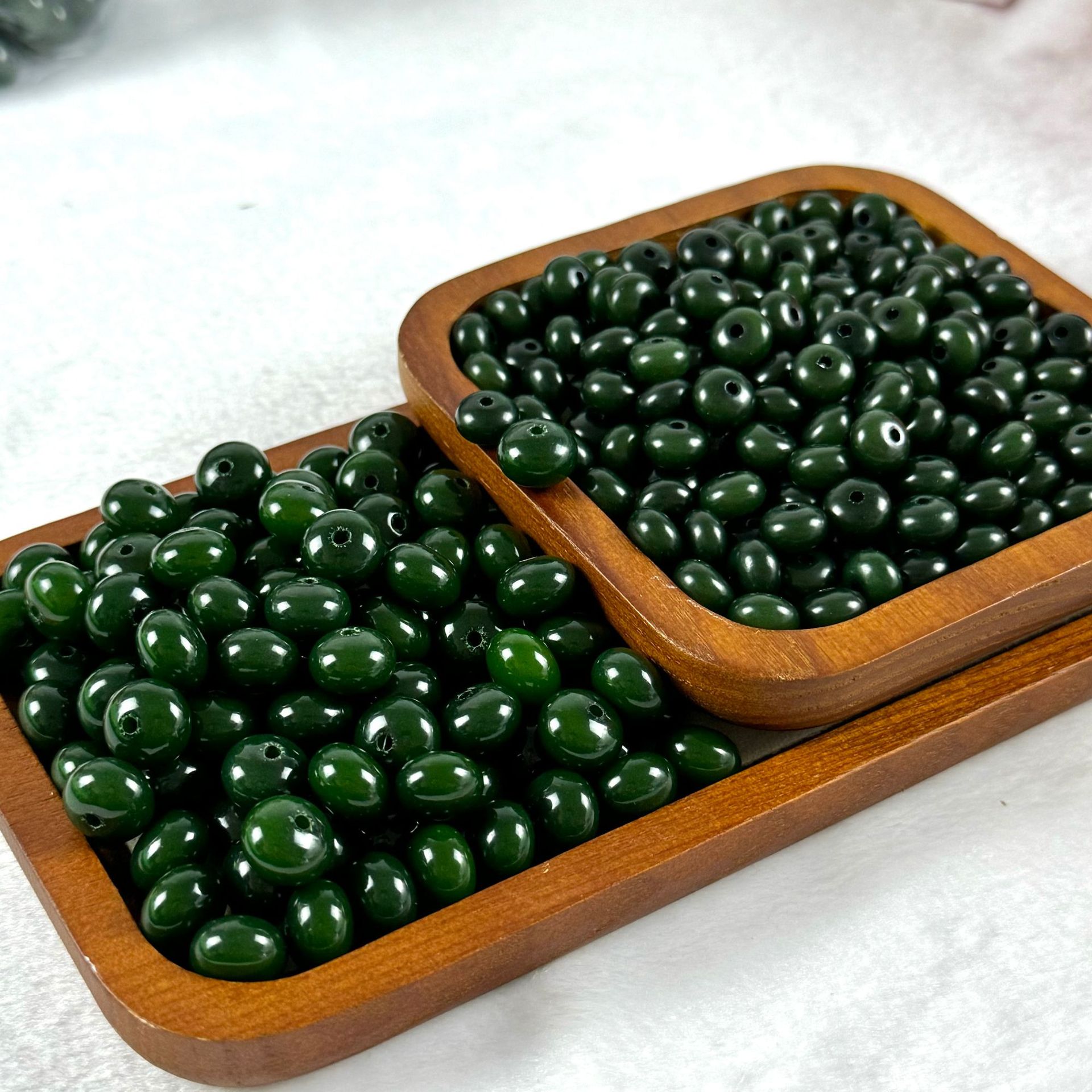 Бусины темно-зеленые счеты 8*11мм