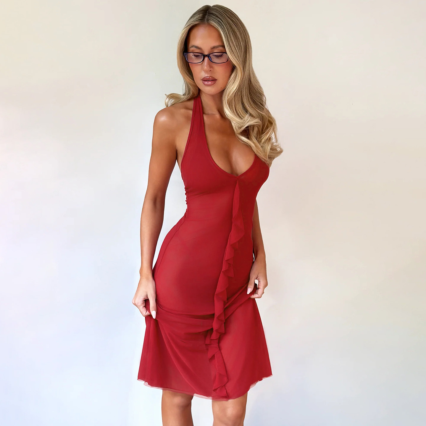 2026 verano nuevo color sólido sin mangas cuello en V delgado cuello irregular sexy vestido de espalda abierta