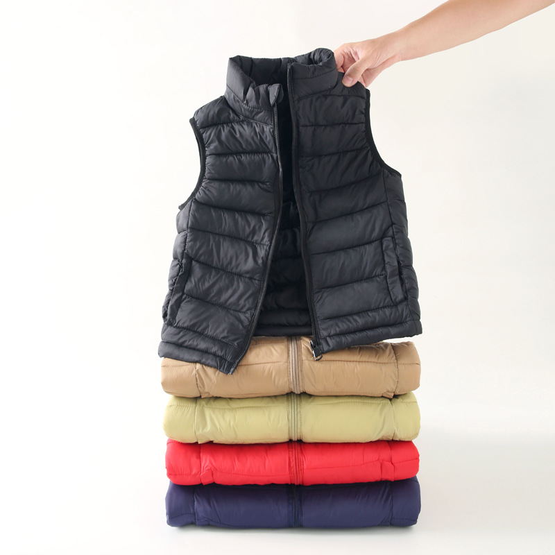 Lightweight down-filled cotton vest for children in autumn and winter, suitable for boys, girls, and older children. Stand-up collar, outerwear.