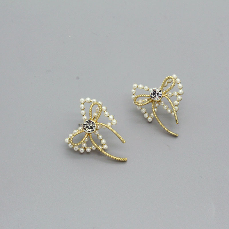 Korea Bowknot Pearl Alloy Earrings display picture 2