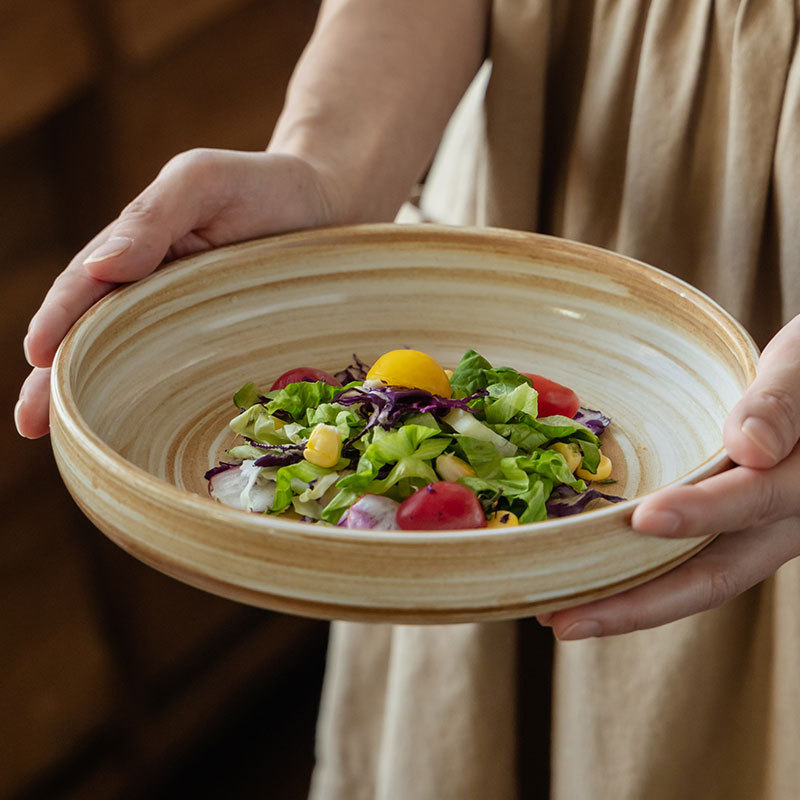 Hacer platos de platos de cerámica de tornillo de color creativo al por mayor platos de ensalada de restaurante platos domésticos platos redondos