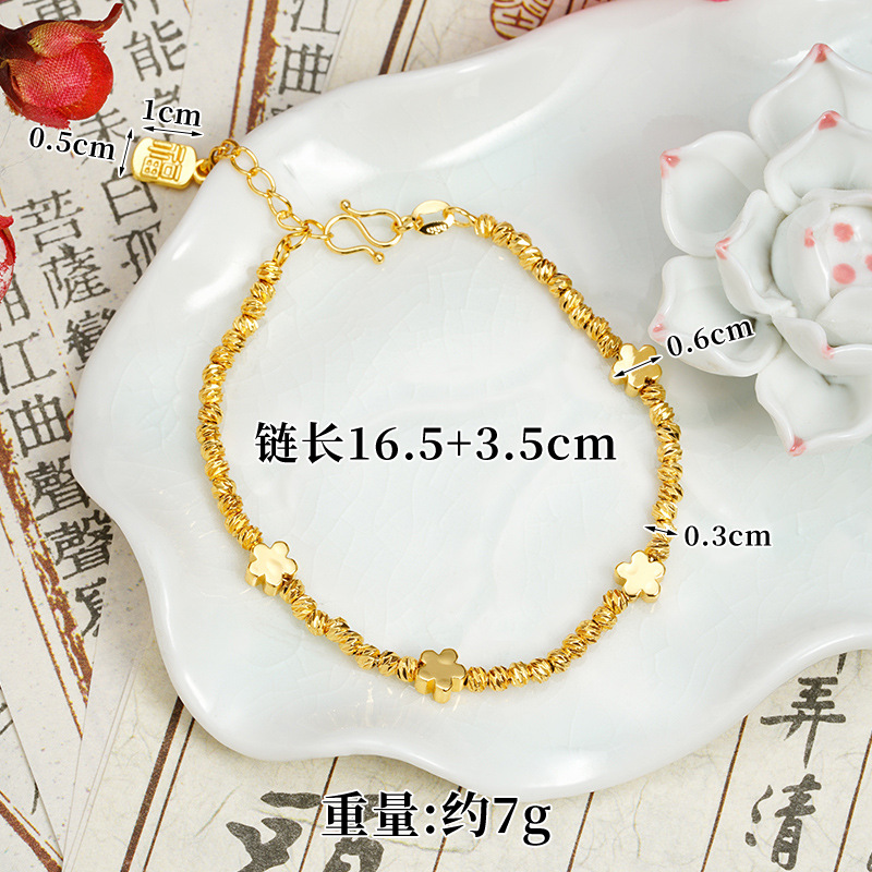 Brazalete de oro de arena de Vietnam lujoso ligero bungee ojo de gato mariposa campana de cuatro hojas brazalete joyería de aleación de cobre al por mayor