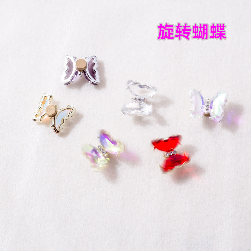 Giratoria de uñas mariposa joyería en línea celebridad tridimensional Rosa cristal alas accesorios DIY mariposa joyería de uñas Taladro