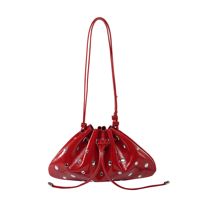 Bolso de cubo de textura transfronteriza 2025 verano nuevo bolso femenino moda gypsophila bolso de hombro remache personalizado bolso de mensajero