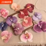 少女侧边粉色仿真花发卡