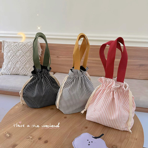 Cute drawstring storage bag, cuffed handbag, portable and cute water cup bag, fashionable outing sundries, women's makeup bag