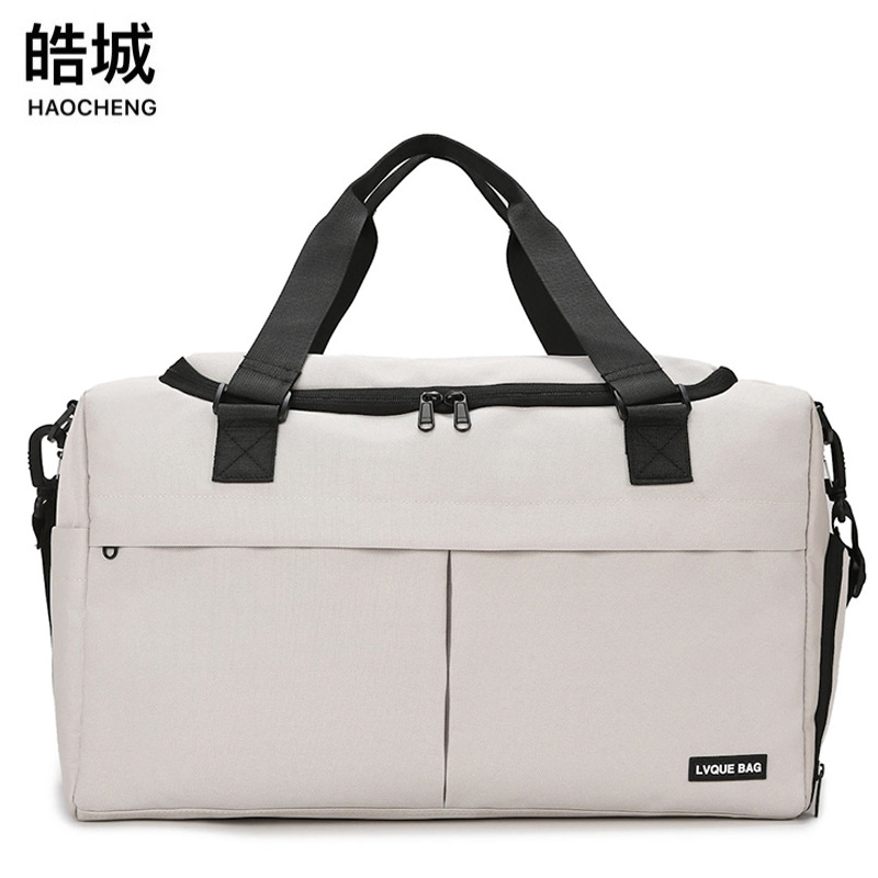 Nueva bolsa de viaje de tela Oxford multifuncional de exportación, bolsa de gimnasio de almacén de zapatos independiente de gran capacidad, bolsa de almacenamiento separada en seco y húmedo