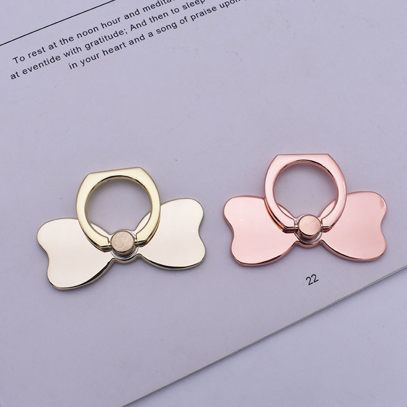 Supporto da tavolo per telefono da donna con nodo a farfalla in metallo a 360°_voghion.com