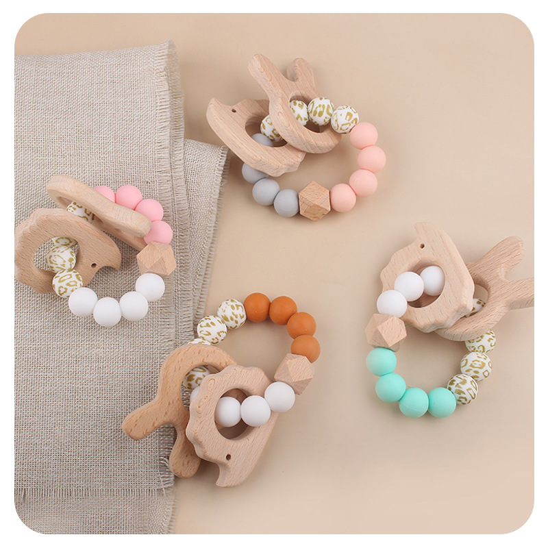 Nuevo bebé conejo bordado pulsera de goma de madera DIY bebé perlas de silicona juguetes de mordida de dientes varilla de molienda