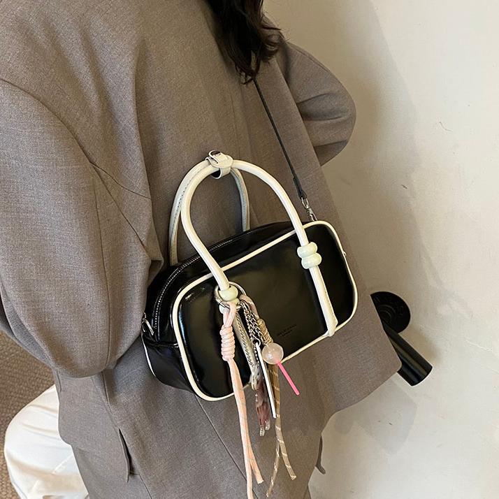 Colores contrastantes de tendencia universal bolso de bolos de mano mujer 2025 nuevo estilo de alto nivel de moda casual mochila de hombro