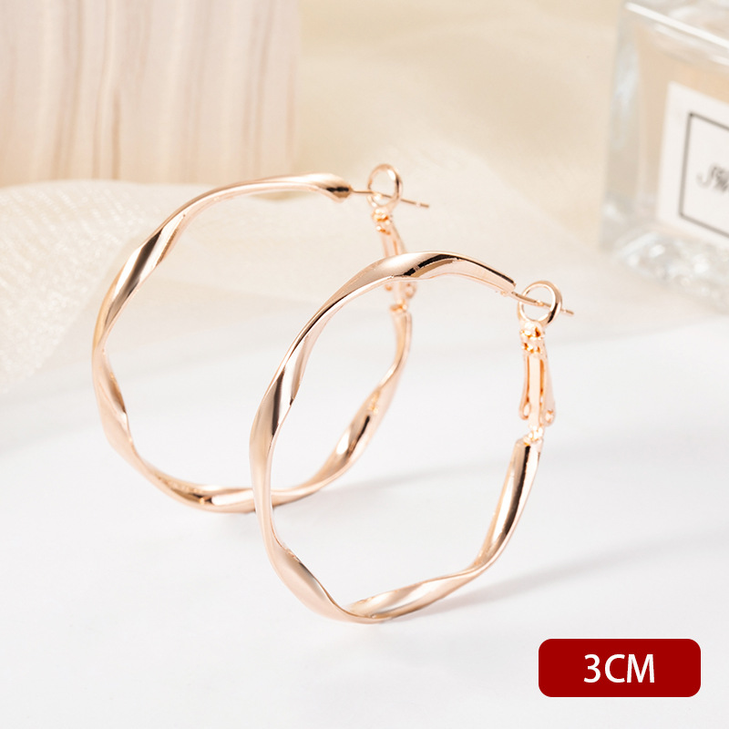 H1030 twisted earrings gold 3CM